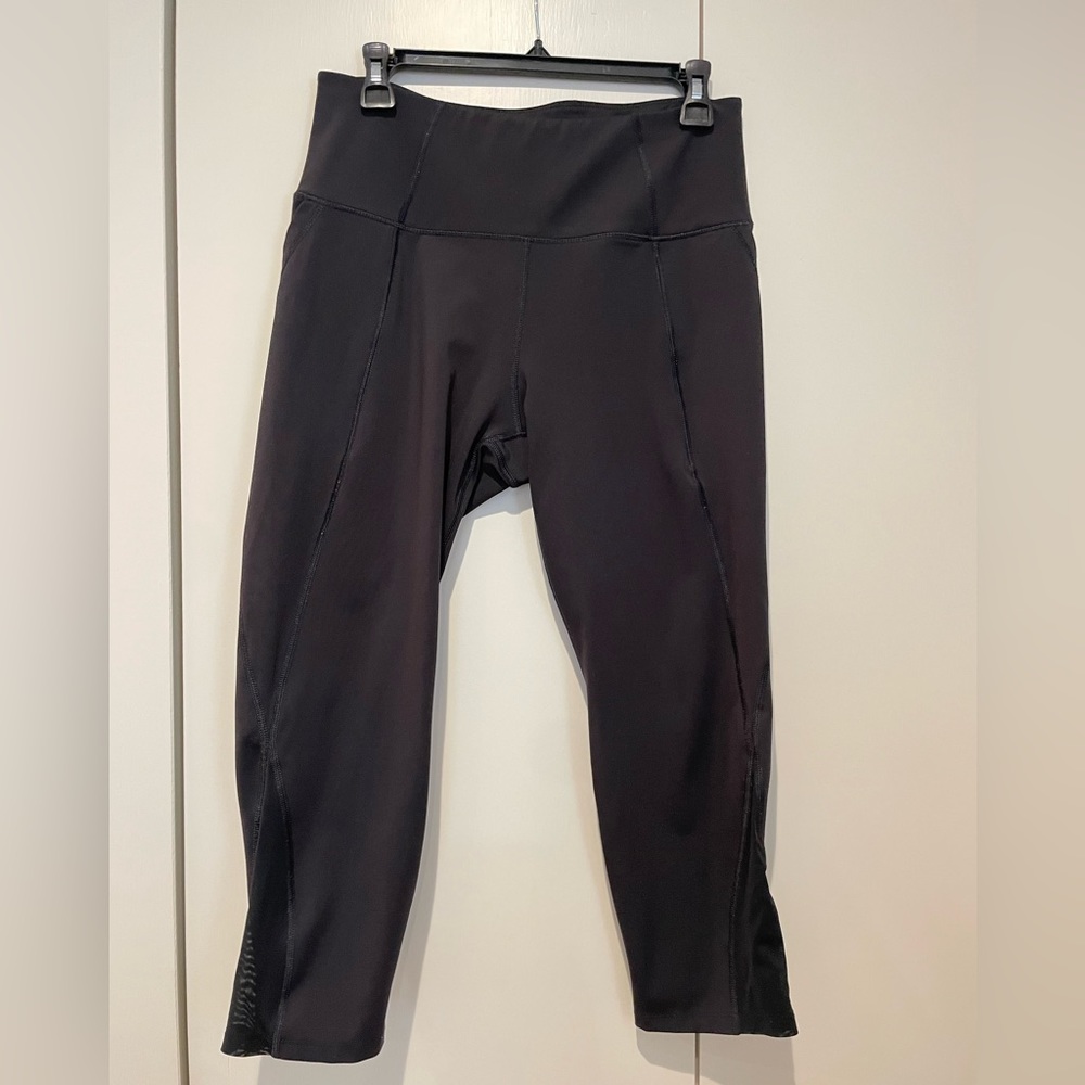 Layer 8 black workout leggings, mesh detail and side pockets.